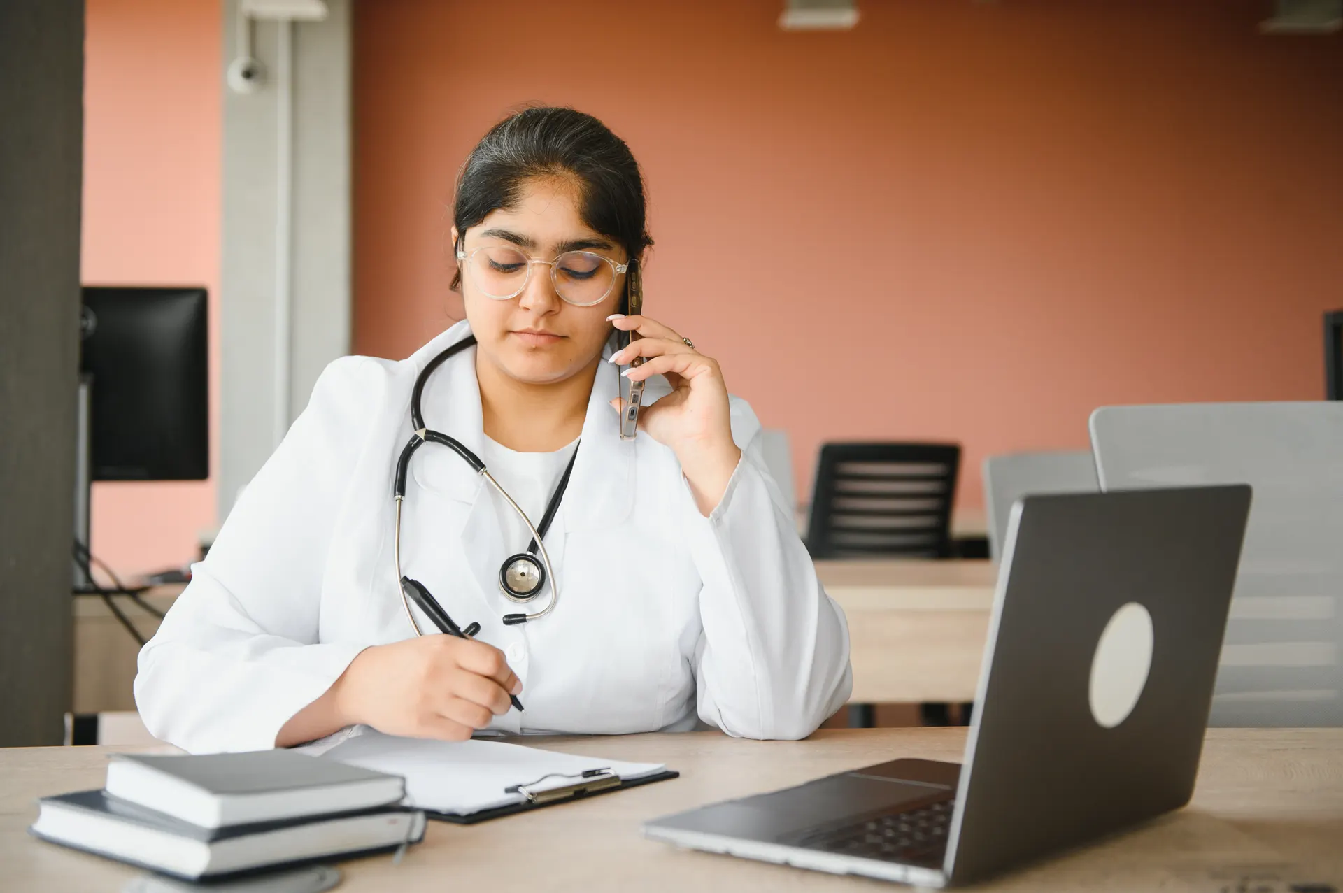Indian female doctor with stethoscope — consult registered doctors online on PingMeDoc