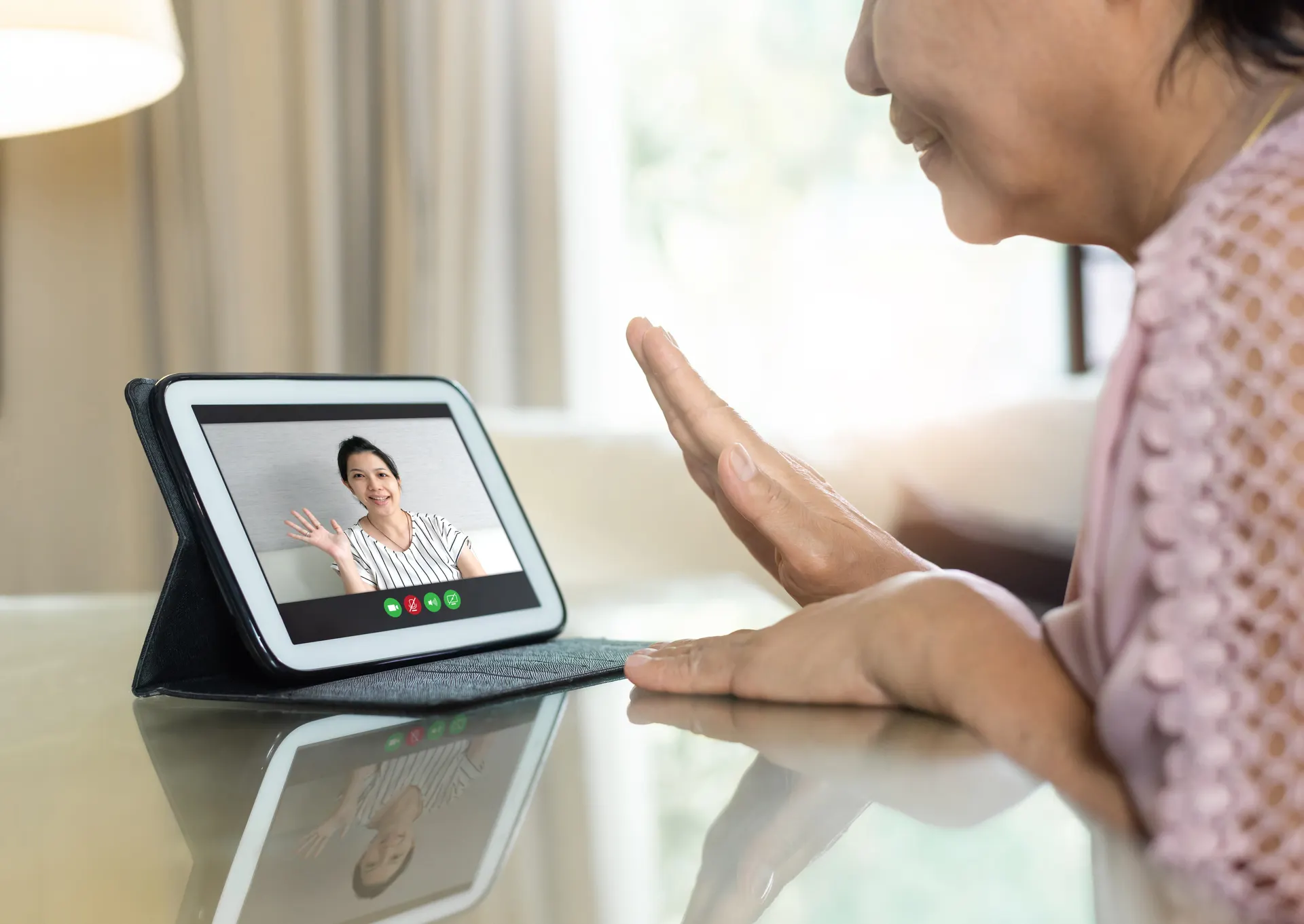 Patient on a video consultation from home — PingMeDoc telemedicine across India