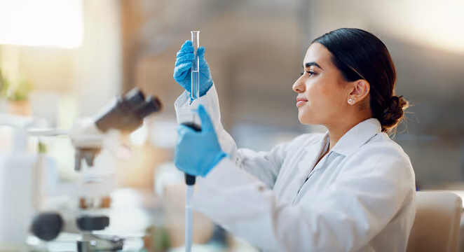 Laboratory professional examining a sample